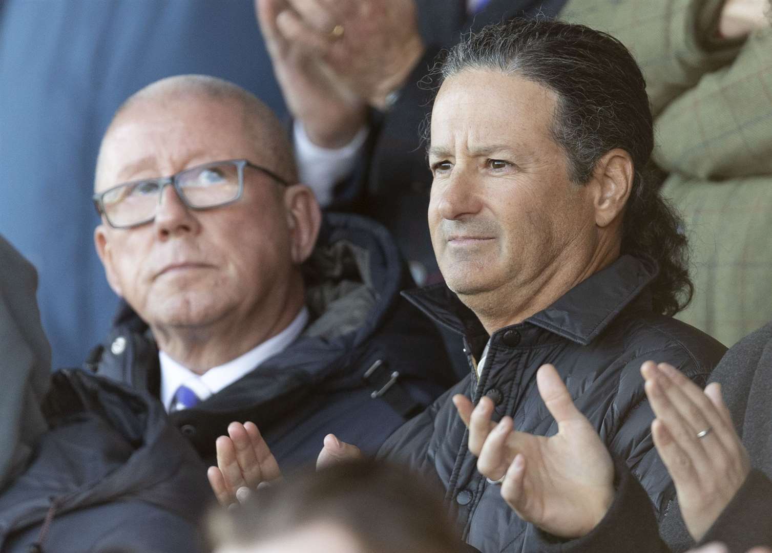 Paul Scally and Brad Galinson watch a Gillingham match after the takeover