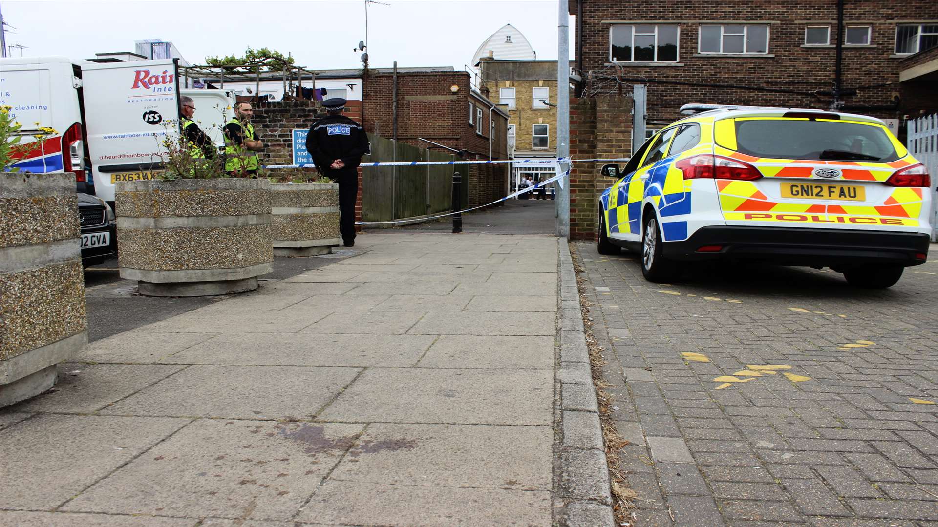 Police guard the scene in Trinity Road car park at Wheatsheaf Alley, Sheerness