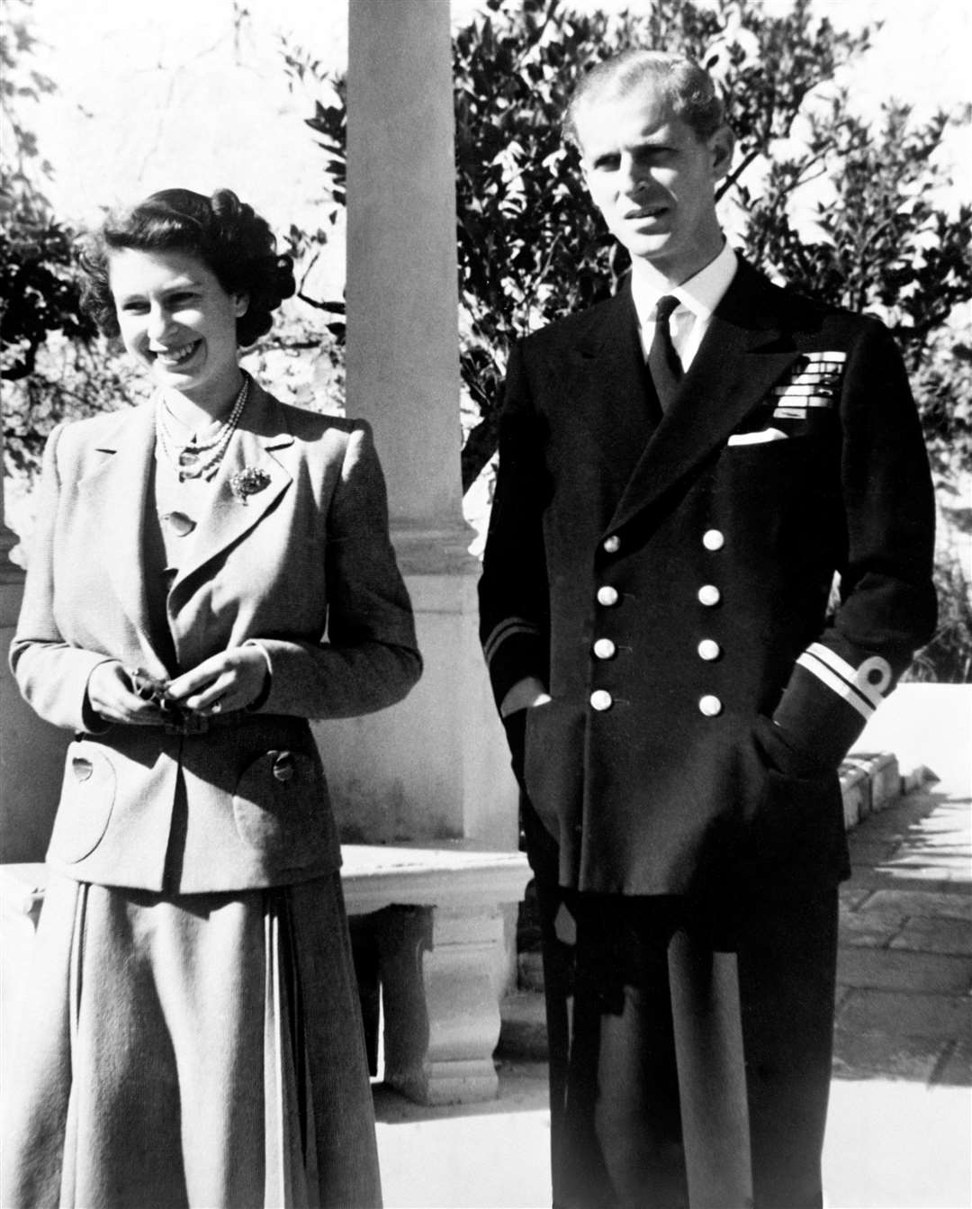 The then-Princess Elizabeth and her husband, Prince Philip, in the garden of the Villa Guardamangia in 1949 (PA)