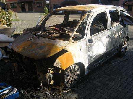 Kerry Sutton's car, which exploded in flames