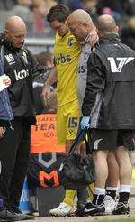 Gills boss Mark Stimson looks on as Scott Vernon limps away Pic: Barry Goodwin