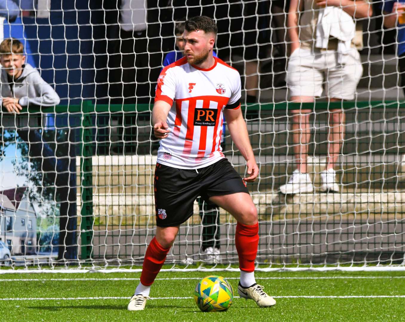 Left-back Jake McIntyre, on the ball for Sheppey United, has been reunited with Jamie Coyle after signing for Whitstable next season. Picture: Marc Richards