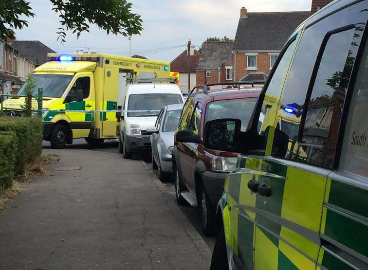 A responder car and an ambulance at the scene