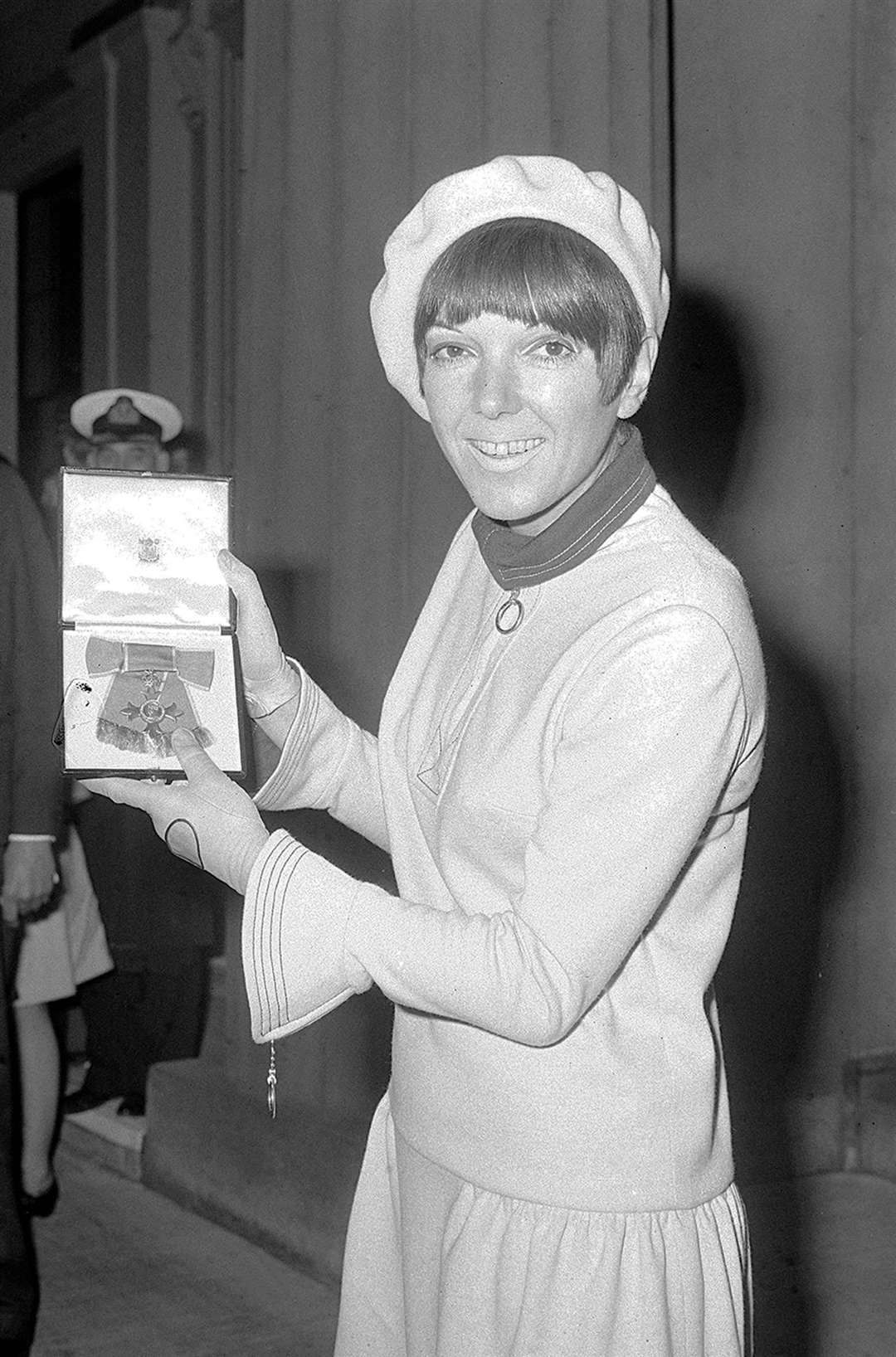 Mini-skirt enthusiast Dame Mary, pictured after receiving an OBE in 1966 (PA)