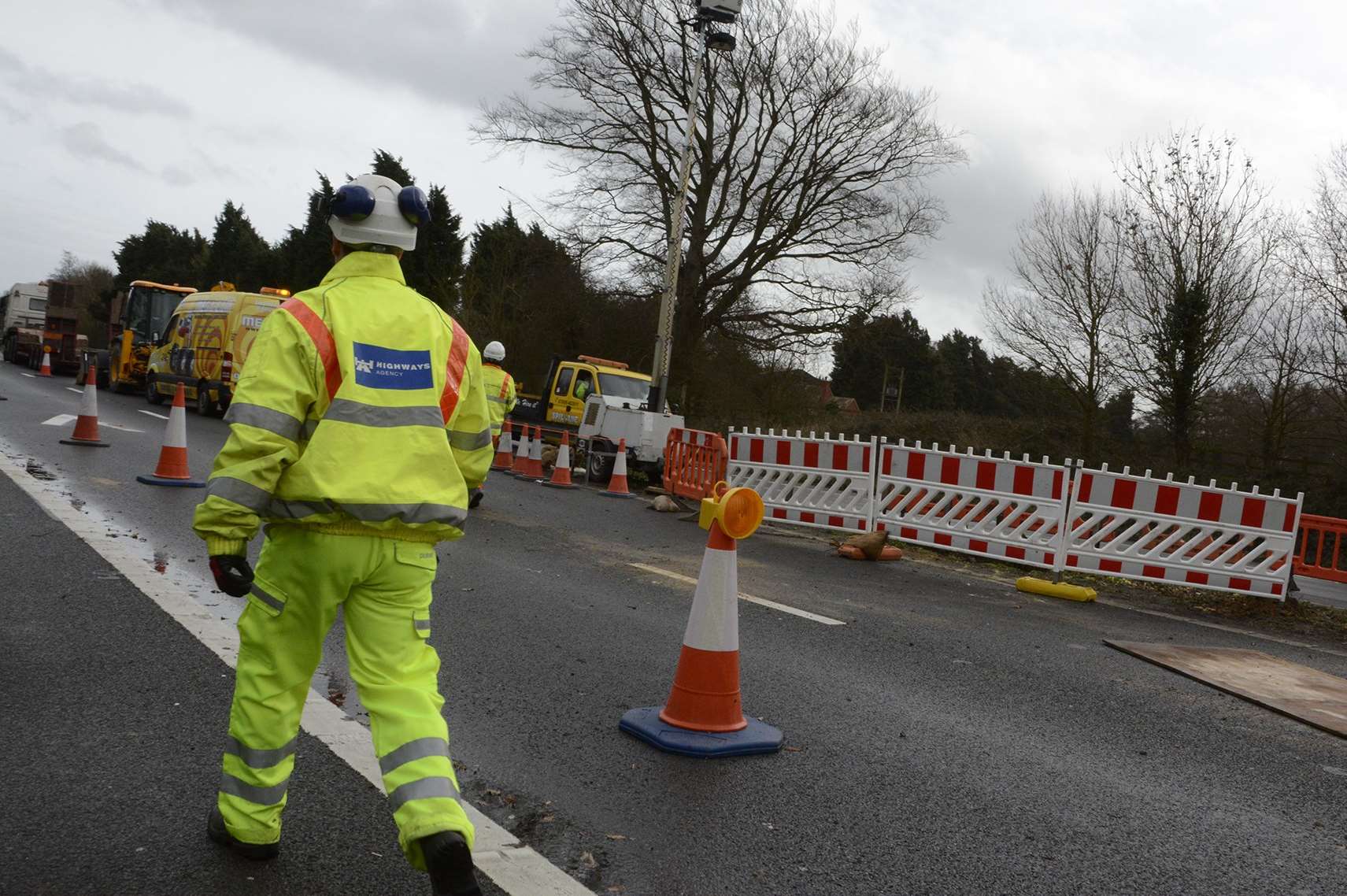 A Highways Agency worker at the scene. Picture: Simon Burchett