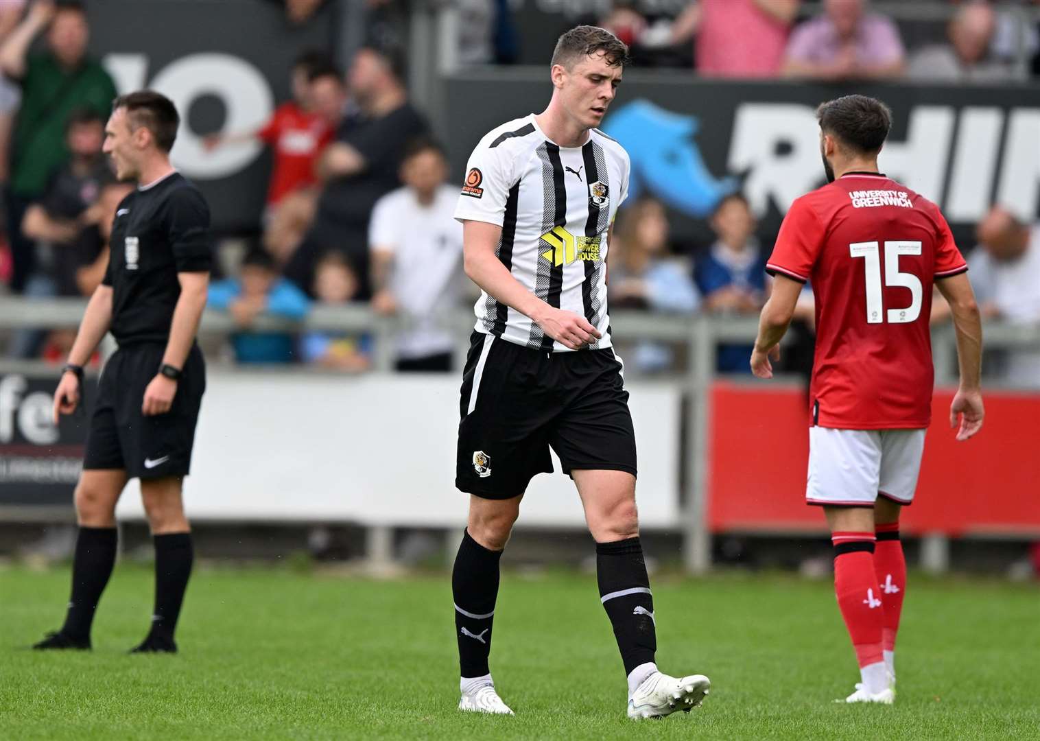 New Dartford midfielder Paul Rooney walks off after seeing red against Charlton. Picture: Keith Gillard