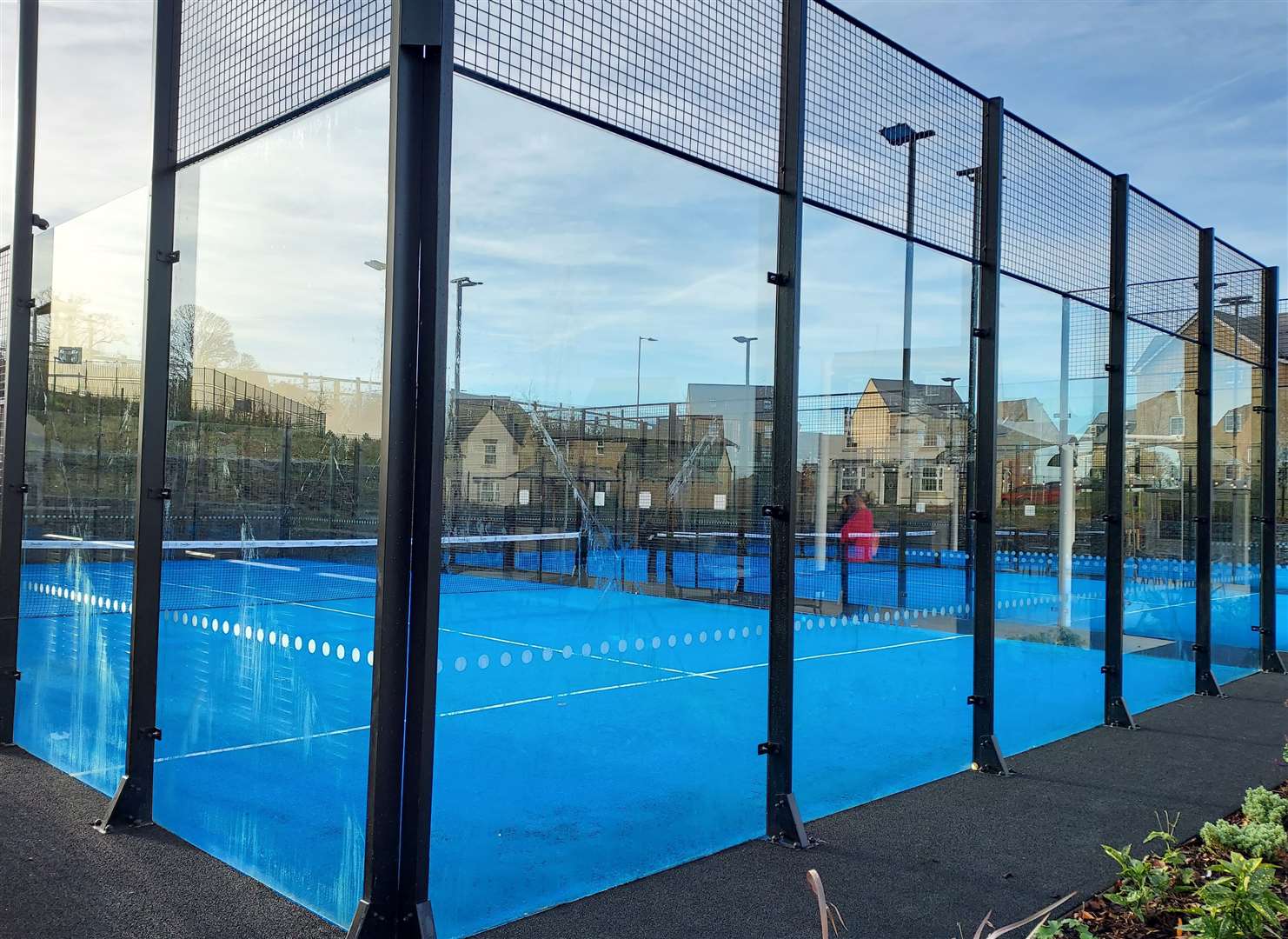 Padel is played in a walled-court, with players using the walls in the game