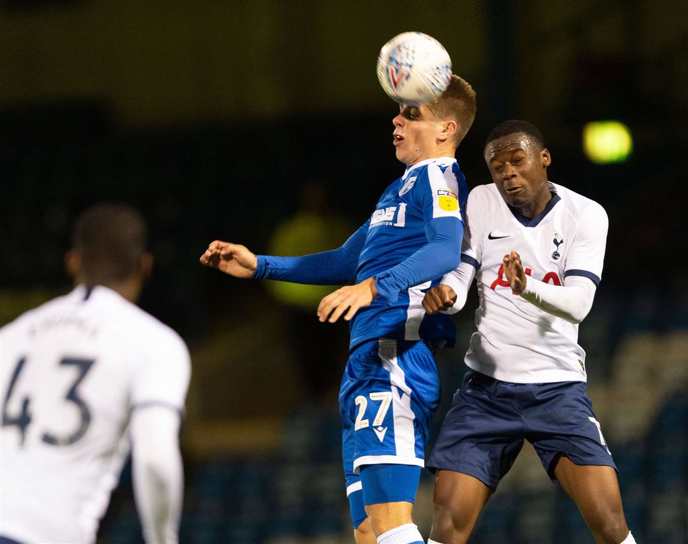 Gillingham defender.Jack Tucker beats Jubril Okedina to the ball Picture: Ady Kerry