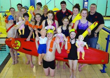 Rod and Andrew Holkham from The Dannyboy Trust with members of Sheerness Swimming Club and Lifeguard Corps, which they have donated equipment to