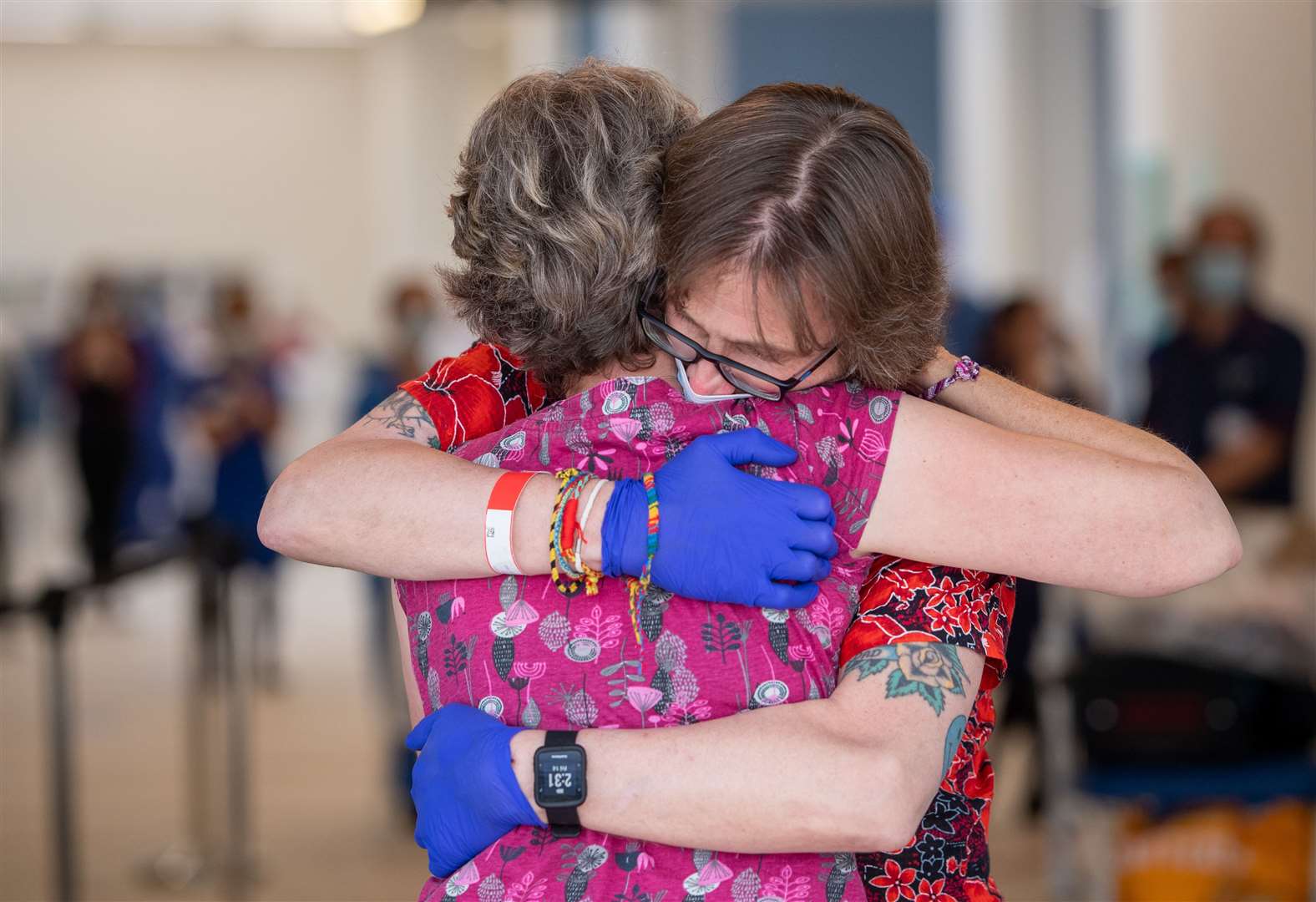 Richard Priest hugs his wife Rachael as he leaves Royal Papworth Hospital (Joe Giddens/PA)