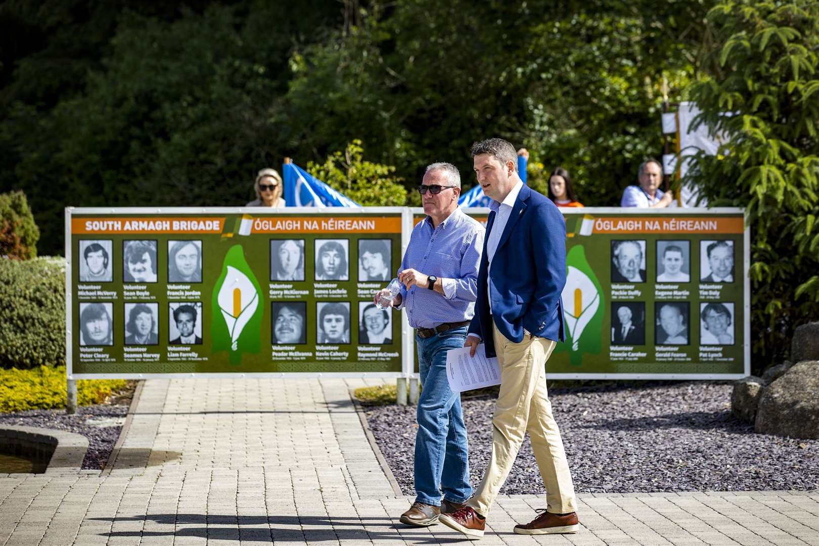 Sinn Fein MP John Finucane, right, with party colleague Conor Murphy MLA during an IRA memorial event in Co Armagh (Liam McBurney/PA)