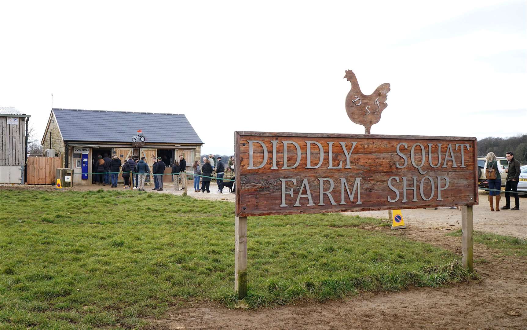 Customers queue to get into Jeremy Clarkson’s Diddly Squat Farm Shop near Chadlington in Oxfordshire in February (Gareth Fuller/PA)