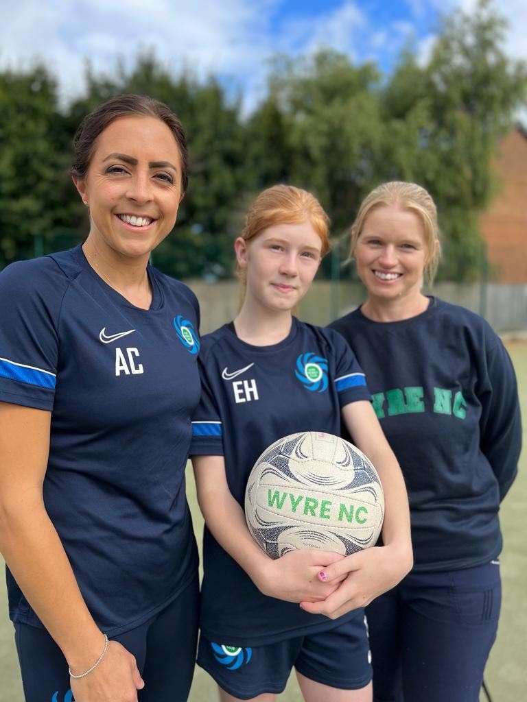 Abby Chamberlain (left) with player Eleanor Hardy, 12, and her mother Pip Hardy (David Hardy/PA)