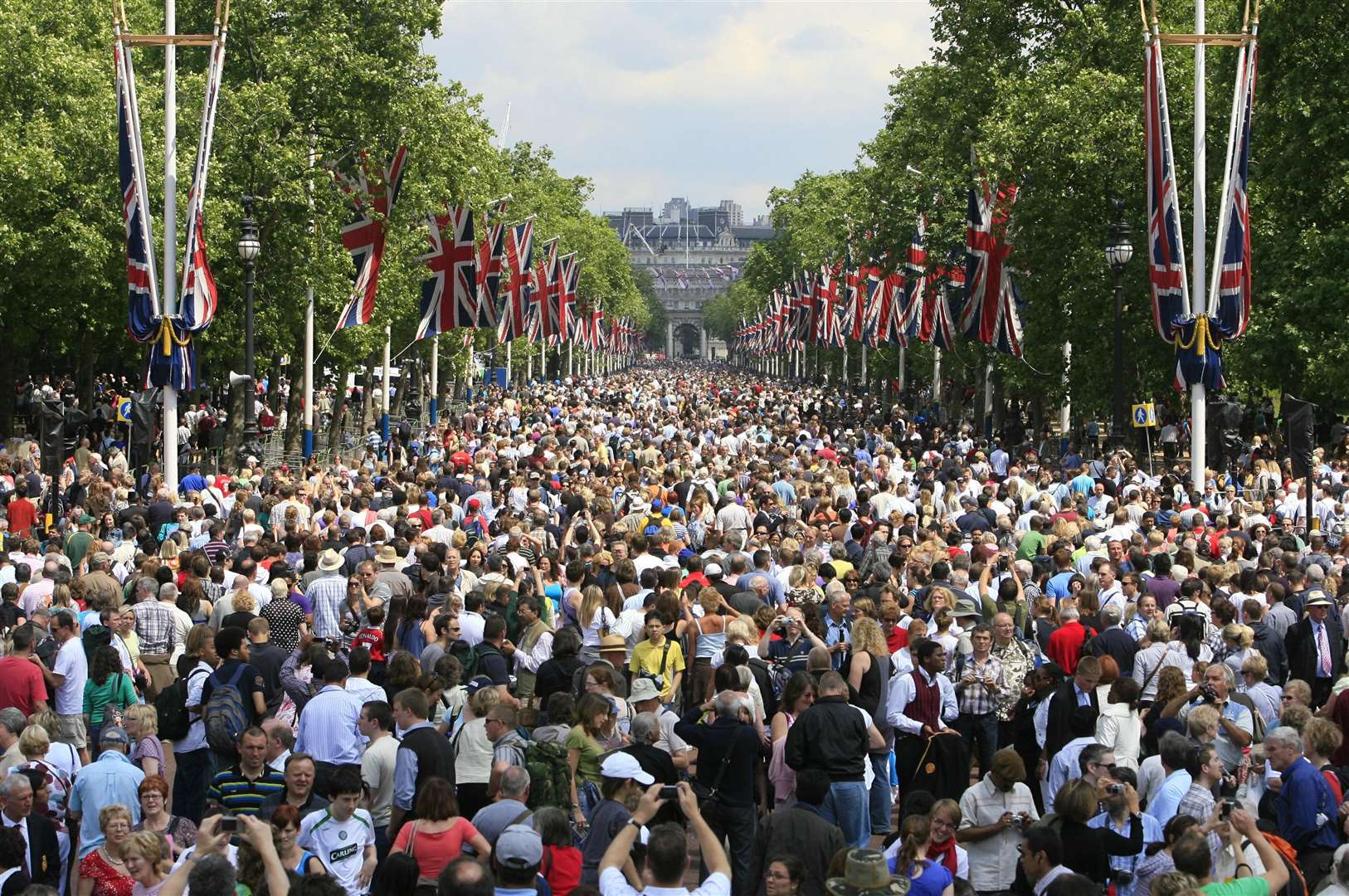 Crowds after watching a flyover after Trooping (Johnny Green/PA)