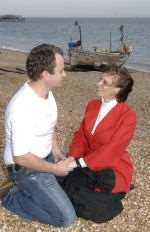 Guy Underwood as Billy Bigelow and Donna Clements as Julie Jordan in Carousel.