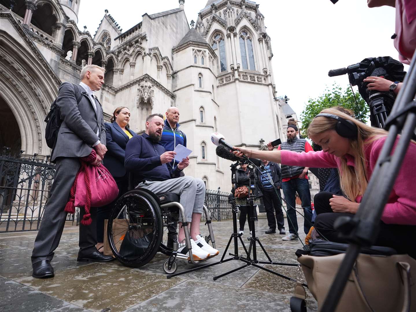 Martin Hibbert (centre) after a previous hearing in the case (James Manning/PA)