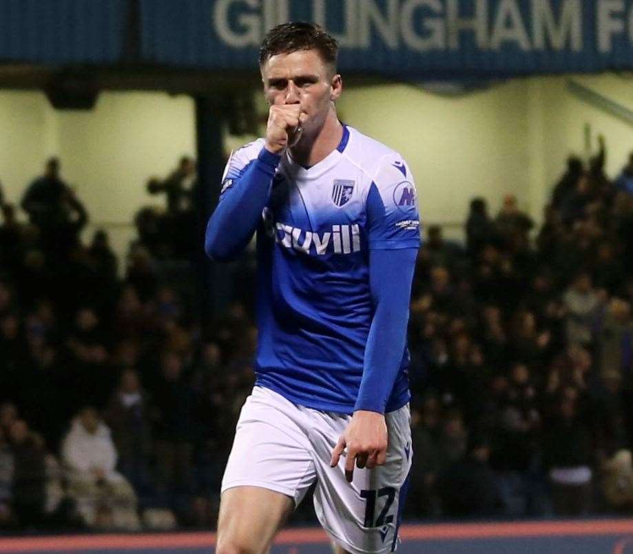 Oli Hawkins celebrates his goal in Gillingham’s 2-2 home draw against Swindon on Tuesday. Picture: @Julian_KPI