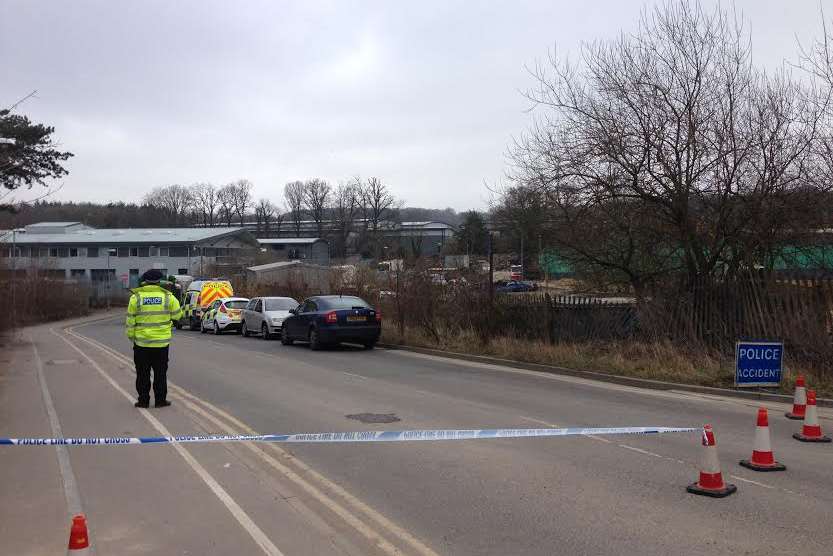 Police have sealed off the road leading to the site