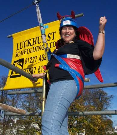 Lord Mayor Carolyn Parry takes part in the zip wire challenge at Canterbury's Dane John Gardens