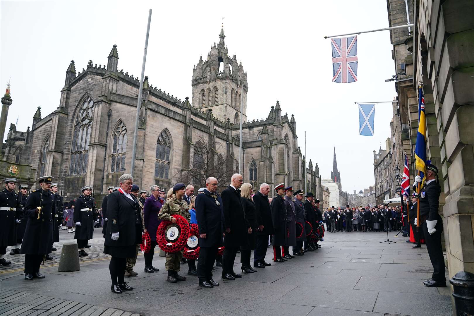 The wreath-laying ceremony followed a military parade down the Royal Mile (Jane Barlow/PA)