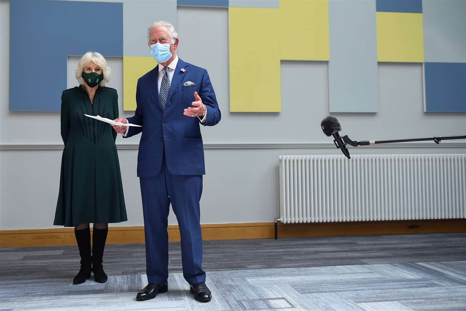 The Prince of Wales and the Duchess of Cornwall during a visit to the Education Authority Headquarters in Belfast (Clodagh Kilcoyne/PA)