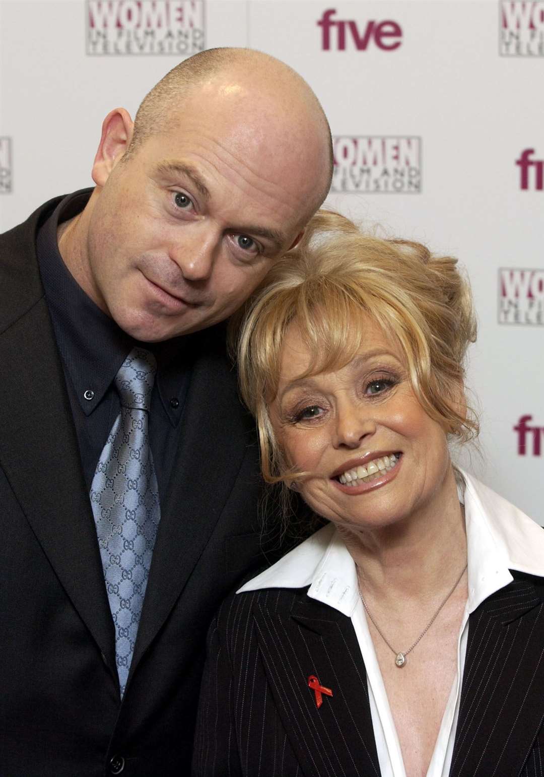 The actress with EastEnders co-star Ross Kemp (Myung Jung Kim/PA)