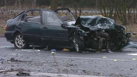 TRAGEDY: The wrecked car at the scene. Picture: NICK JOHNSON