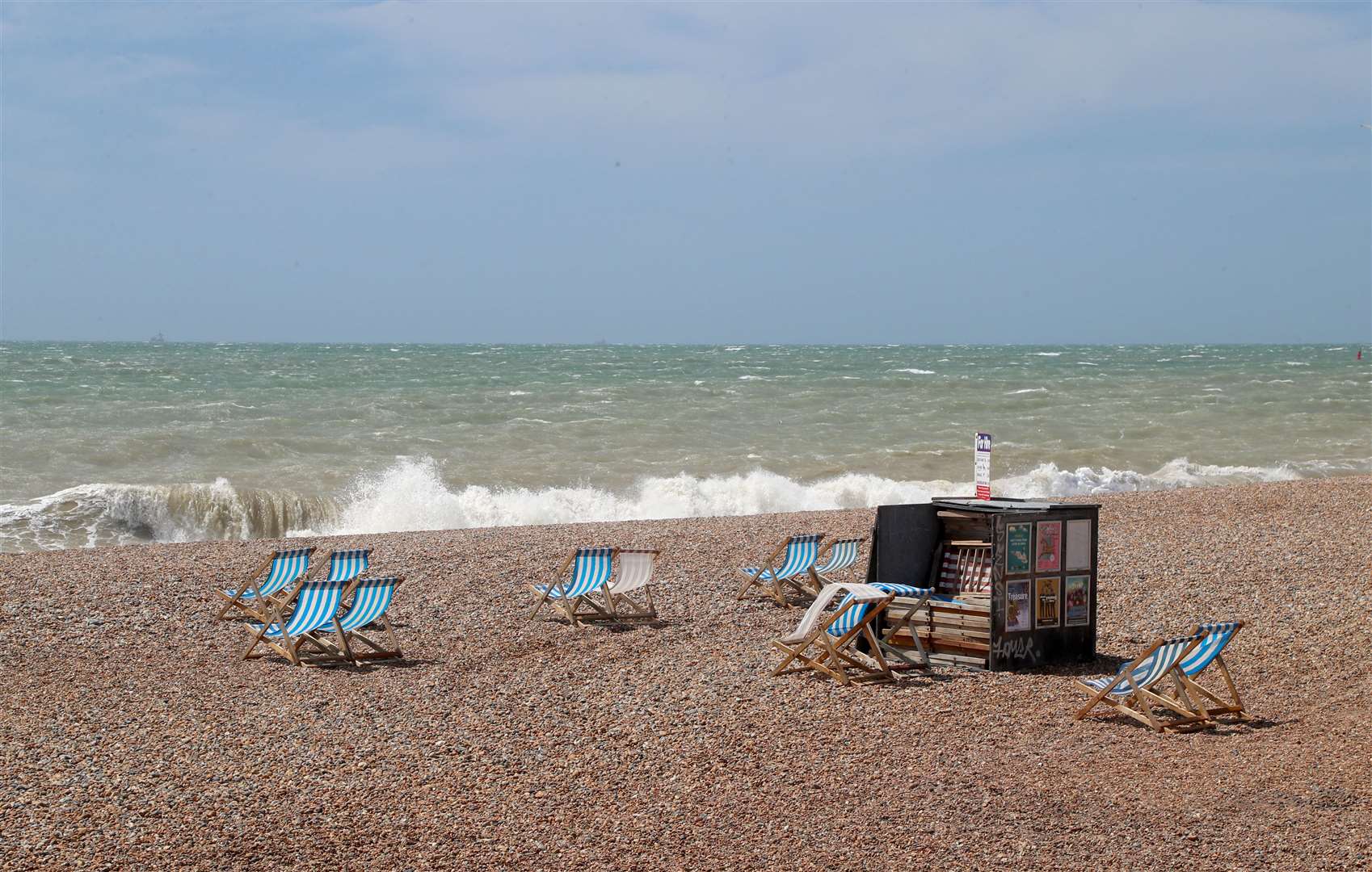 A view of a near empty beach in Brighton (Gareth Fuller/PA)