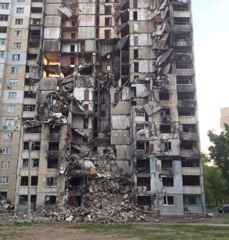 The front of a building completely destroyed from an air strike. Picture: Phil Hodges