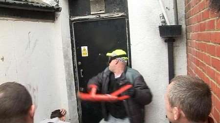 Police officers entering one of the properties. Picture: BBC SOUTH EAST