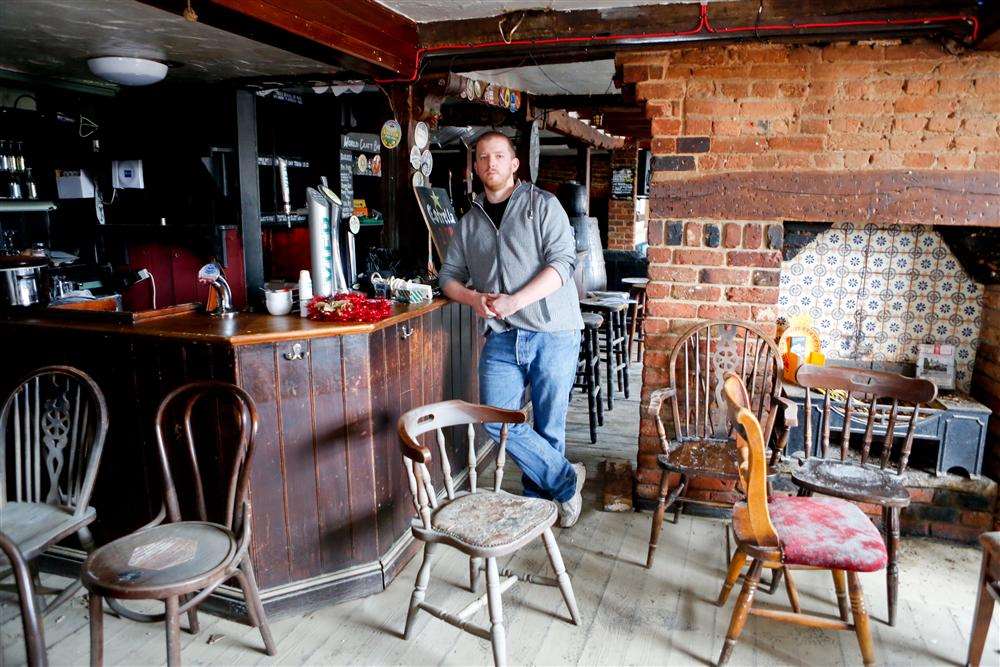 Area manager Will Cheeseman in Drakes which was badly flooded over Christmas 2013