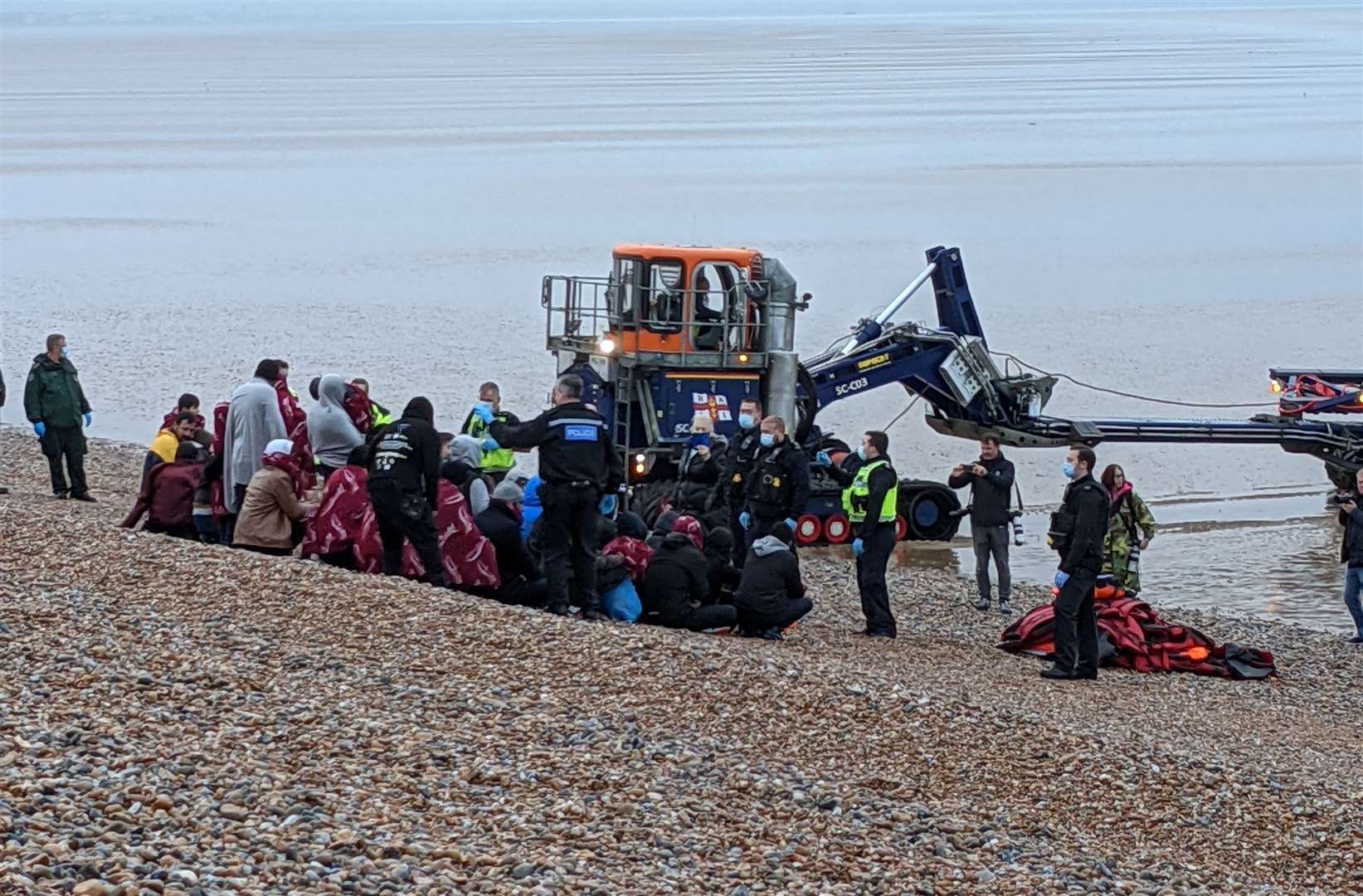 Asylum seekers arriving at Dungeness and were assisted by the RNLI. Picture: Paul Fenney