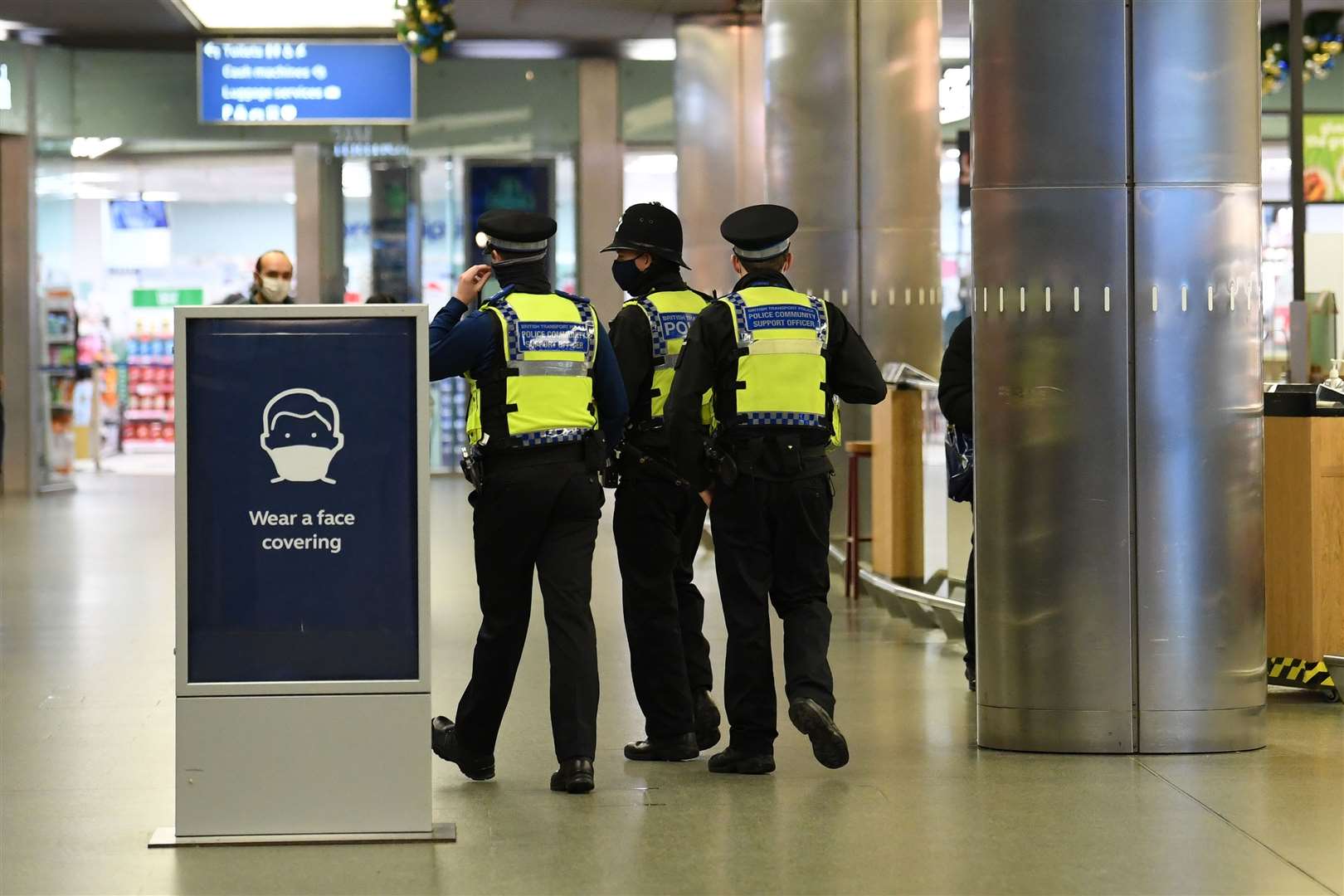 Police officers patrol at St Pancras station (Stefan Rousseau/PA)