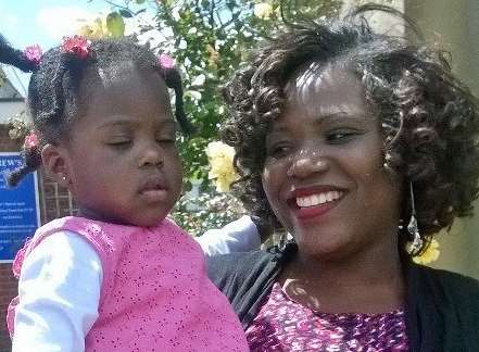 Lillian Oluk, 36, and her daughter