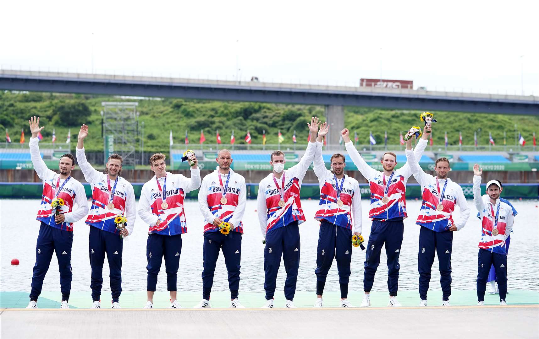 Great Britain’s Josh Bugajski, Jacob Dawson, Tom George, Mohamed Sbihi, Charles Elwes, Oliver Wynne-Griffith, James Rudkin, Tom Ford and Henry Fieldman (Cox) receive their bronze medals (Mike Egerton/PA)