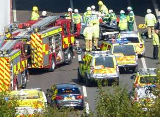 The emergency services at the scene. Picture Kent_999