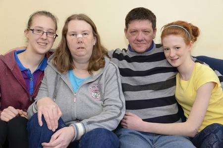 Sam and Kerrie Johnson used first aid skills they learned as Guides to help their injured mother Sharon, pictured with husband Chris