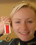 BIG SMILE: delighted with her medals. Picture: BARRY DUFFIELD