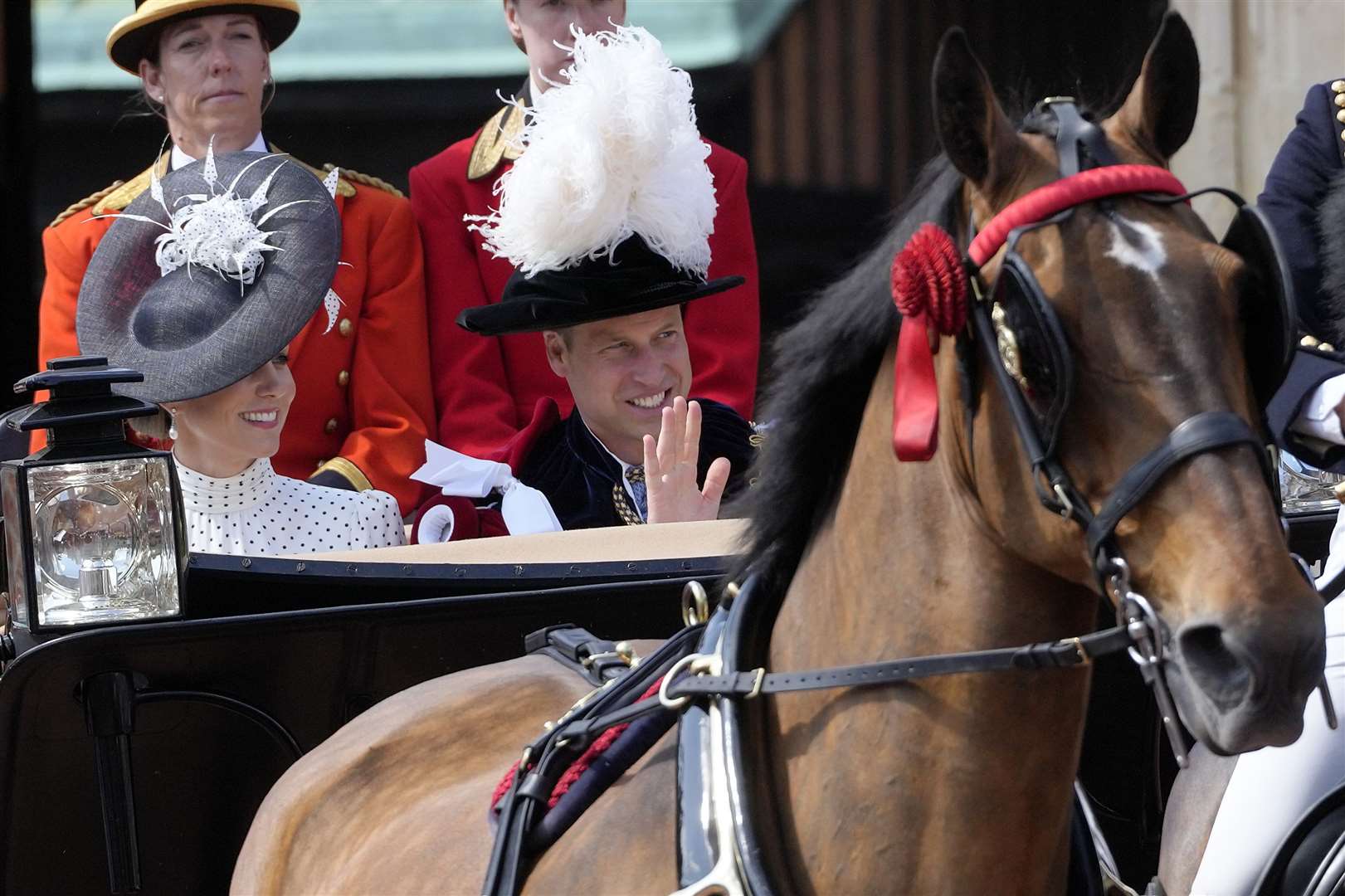 The Prince and Princess of Wales depart in a carriage (Kirsty Wigglesworth/PA)