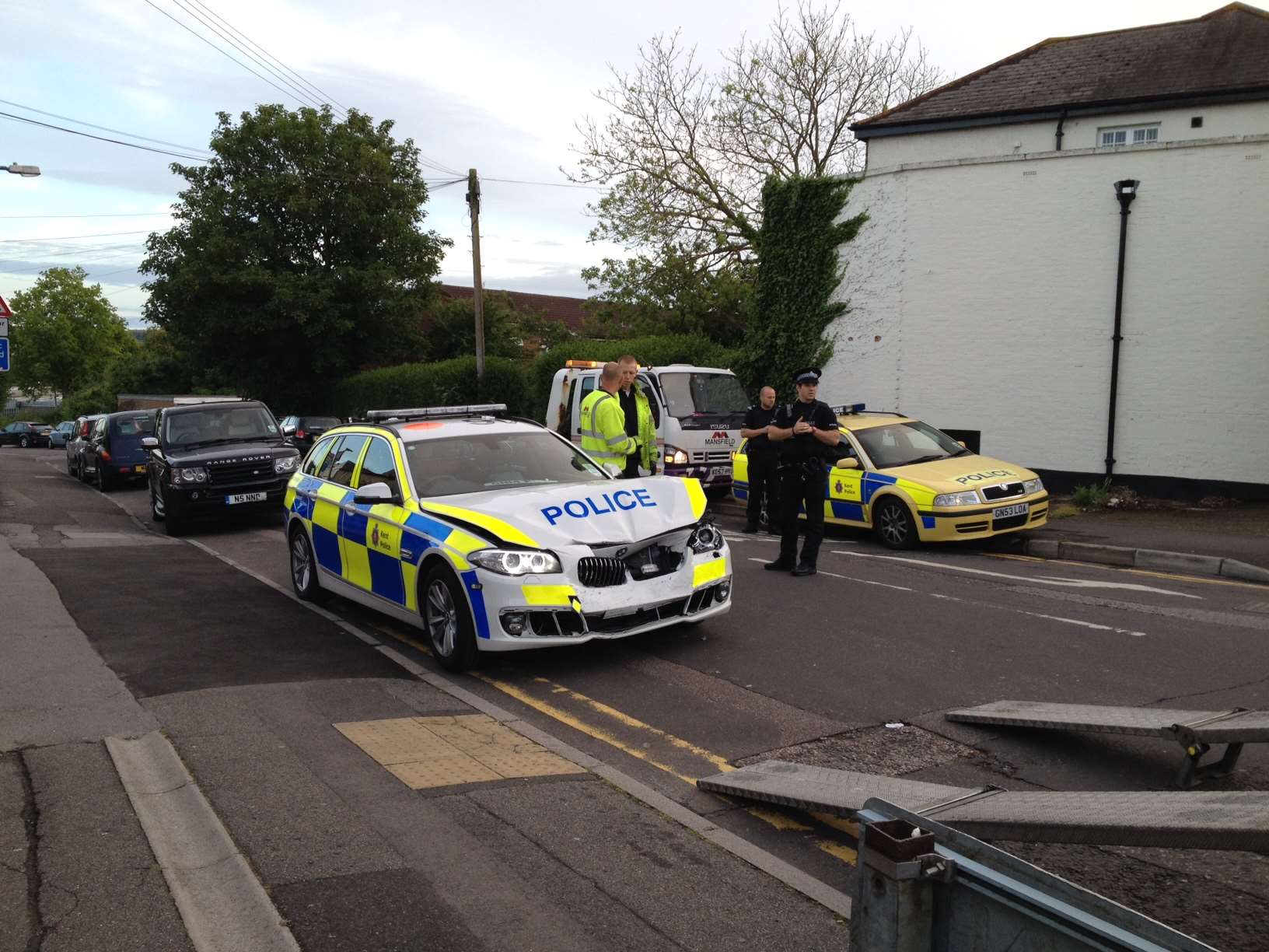 The brand new police car damaged following a collision