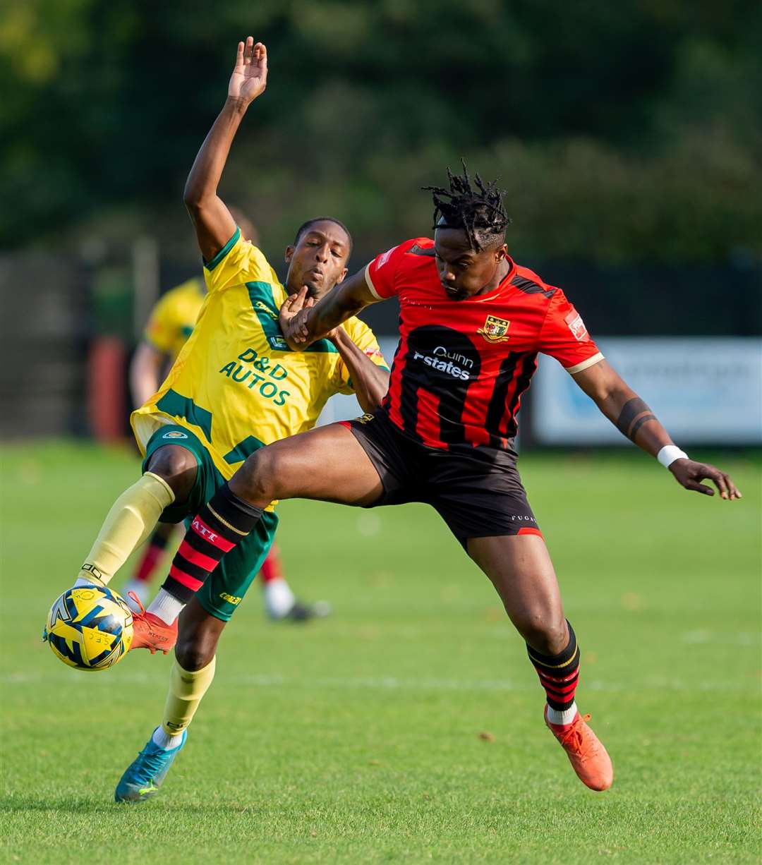 Ashford midfielder Lanre Azeez makes a challenge. Picture: Ian Scammell