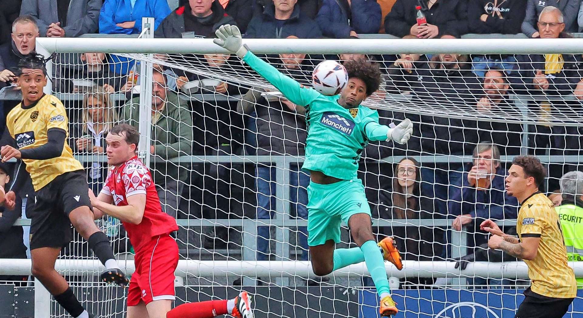 Maidstone United keeper Alexis Andre Jr in the thick of it on his way to a clean sheet in Saturday’s 1-0 home win against Hemel Hempstead Town. Picture: Helen Cooper