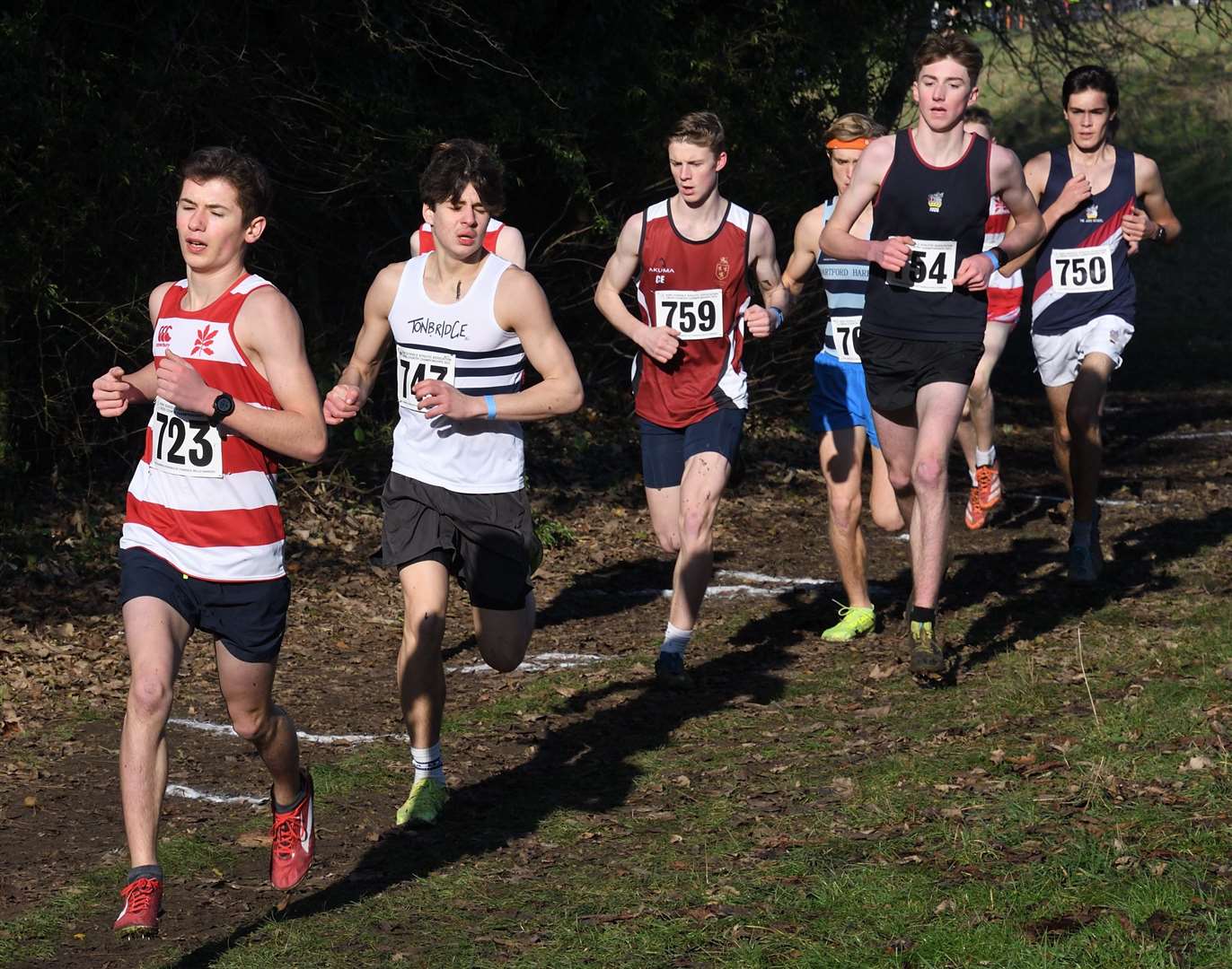 Sevenoaks' John Dunlop (No.723) battles for position in the senior boys' race. Picture: Simon Hildrew (62006071)