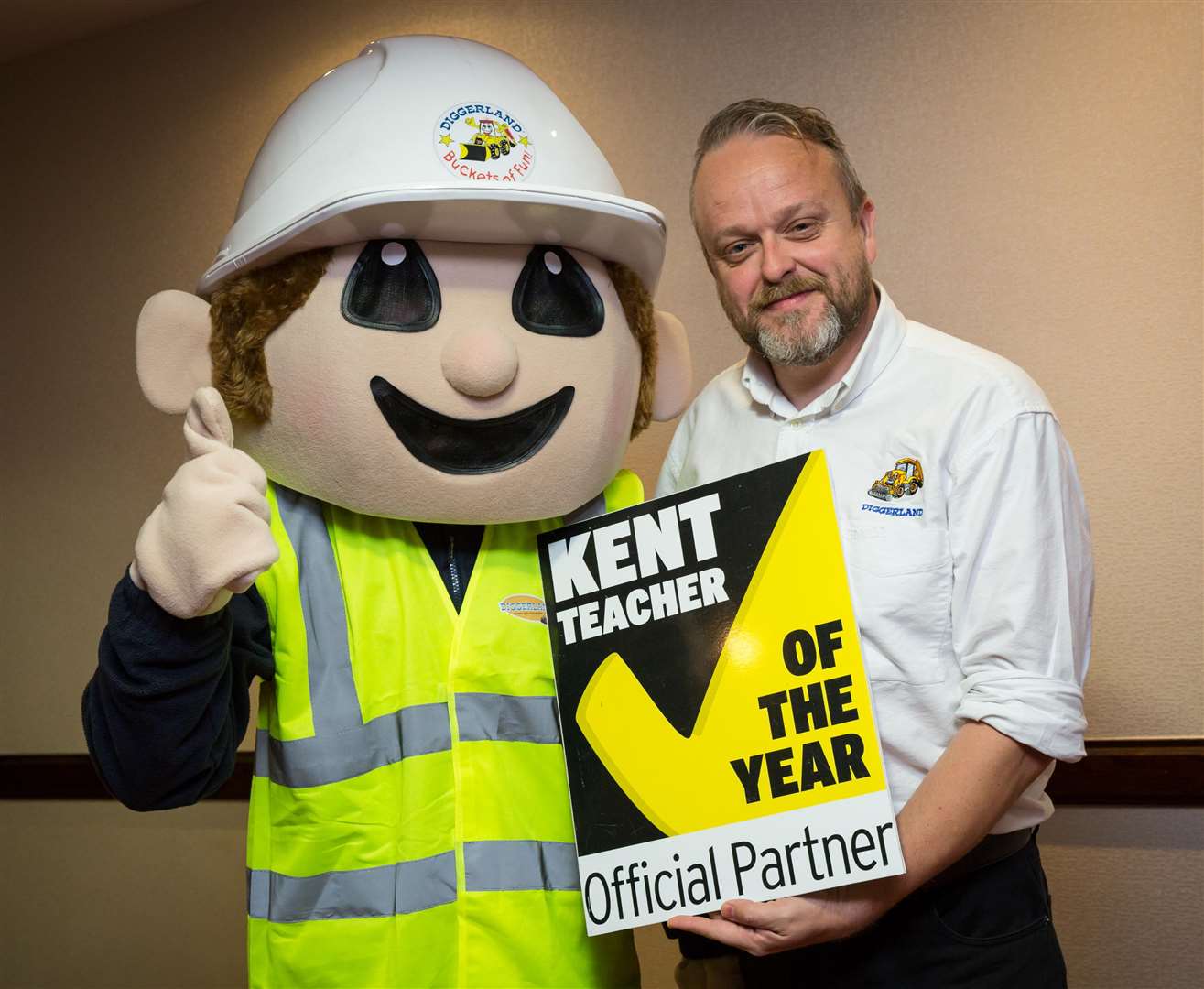 Steve Biggs of Diggerland, pictured with the theme park's mascot, is backing the Kent Teacher of the Year Awards.