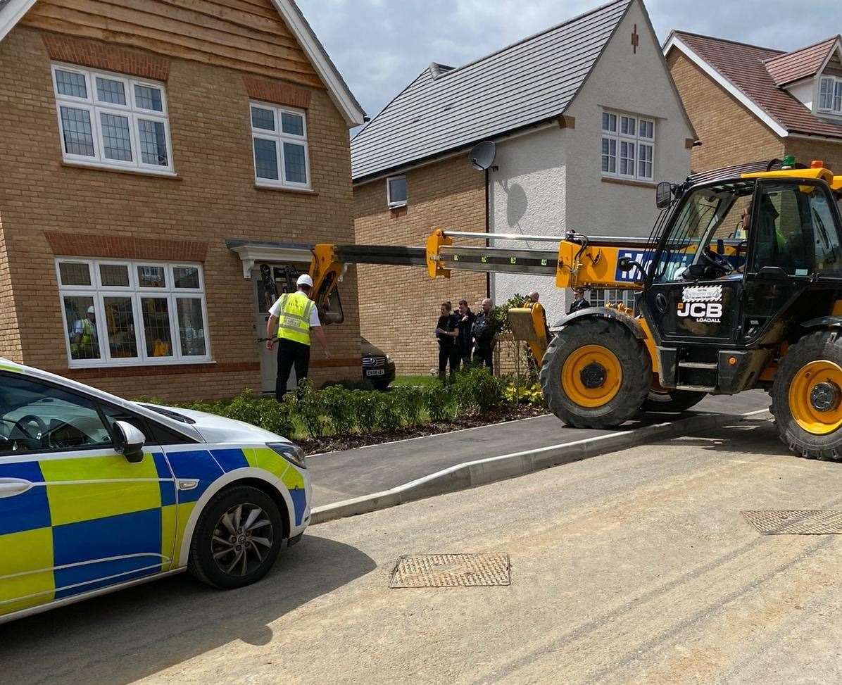 A fork truck was used to gain entry to the property