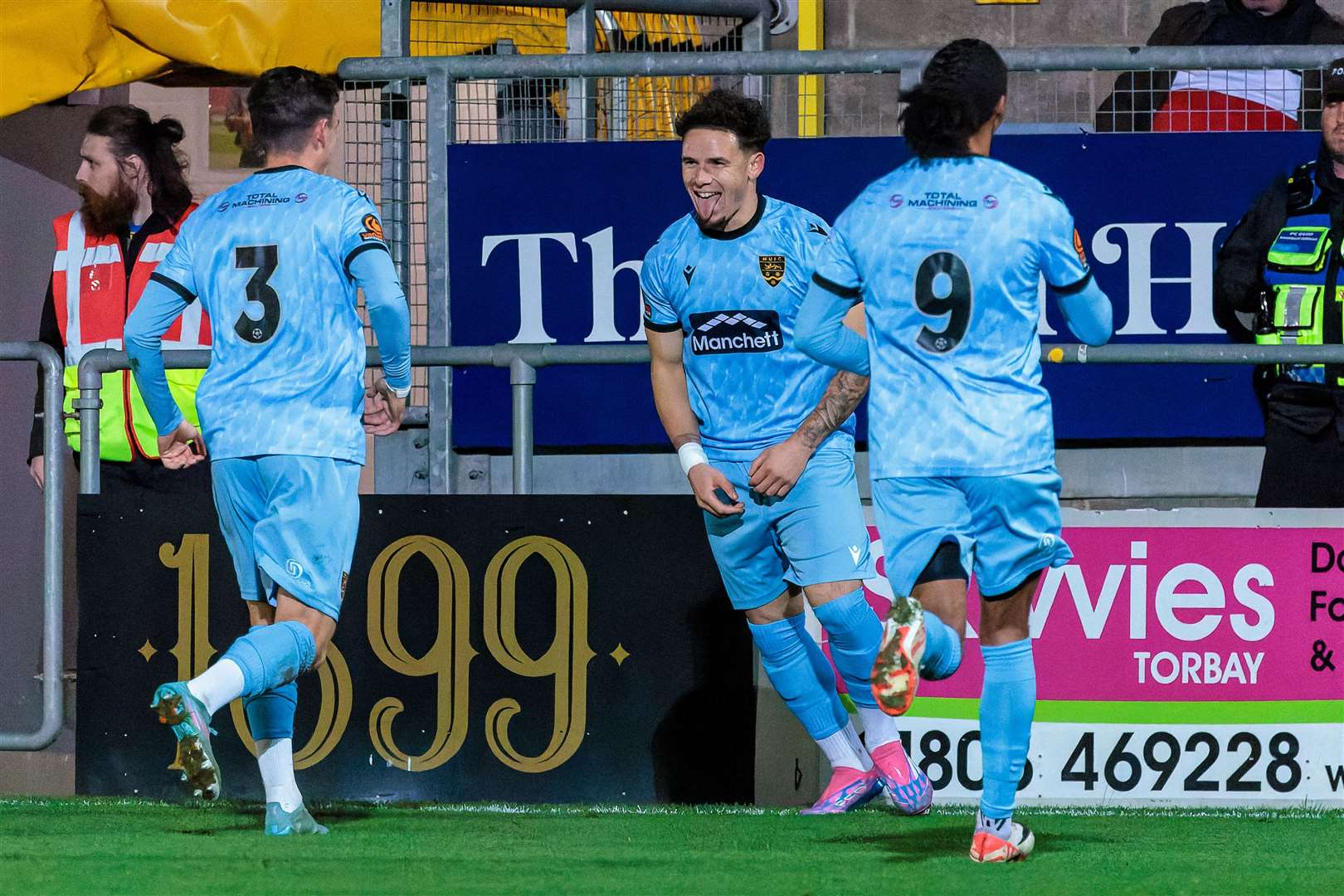 Charlie Seaman, centre, celebrates after putting Maidstone in front from a 25-yard free-kick. Picture: Helen Cooper