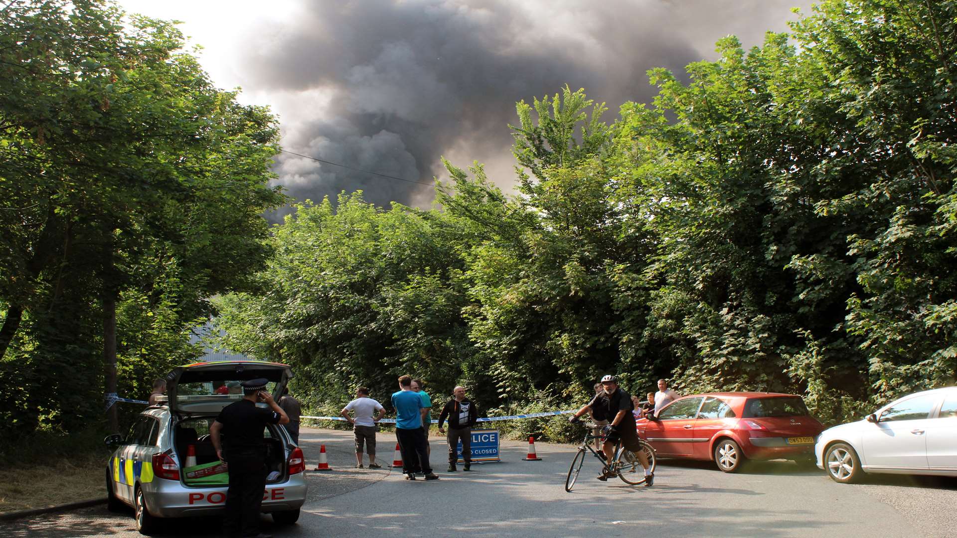 Police cordon off roads around the recycling depot fire. Picture: Pete Bassett