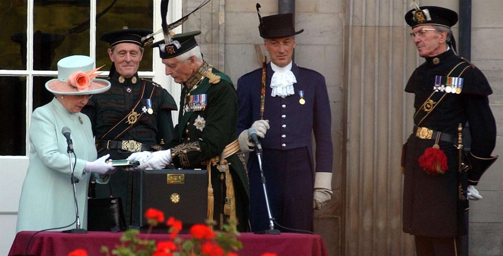 Lord Airlie, Captain General of The Royal Company of Archers, presents a Reddendo to Queen (Danny Lawson/PA)