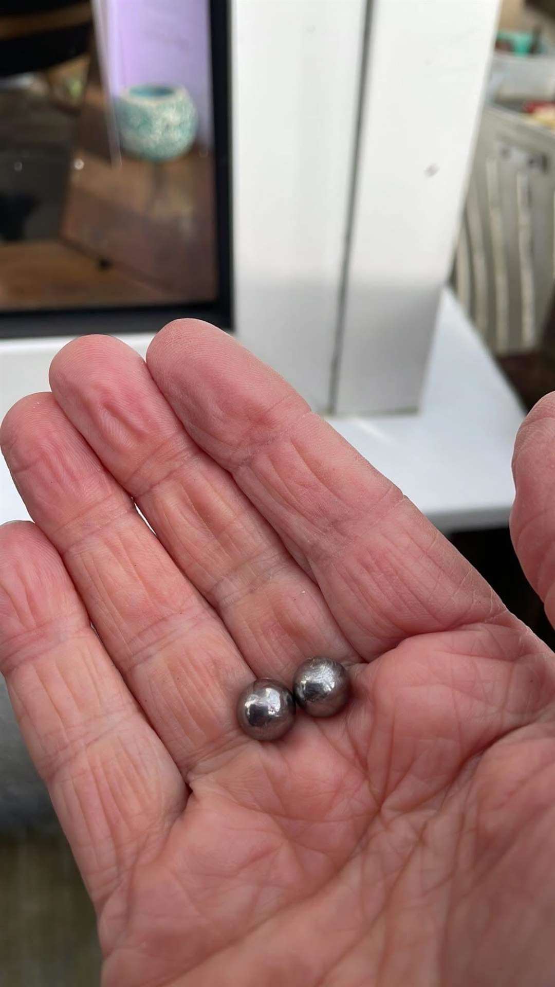 Recovered ball bearings used by the louts to smash the glass. Picture: Lydden Village Community Group