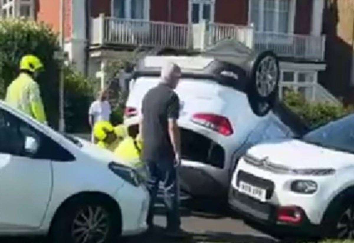 Car overturns on seafront road